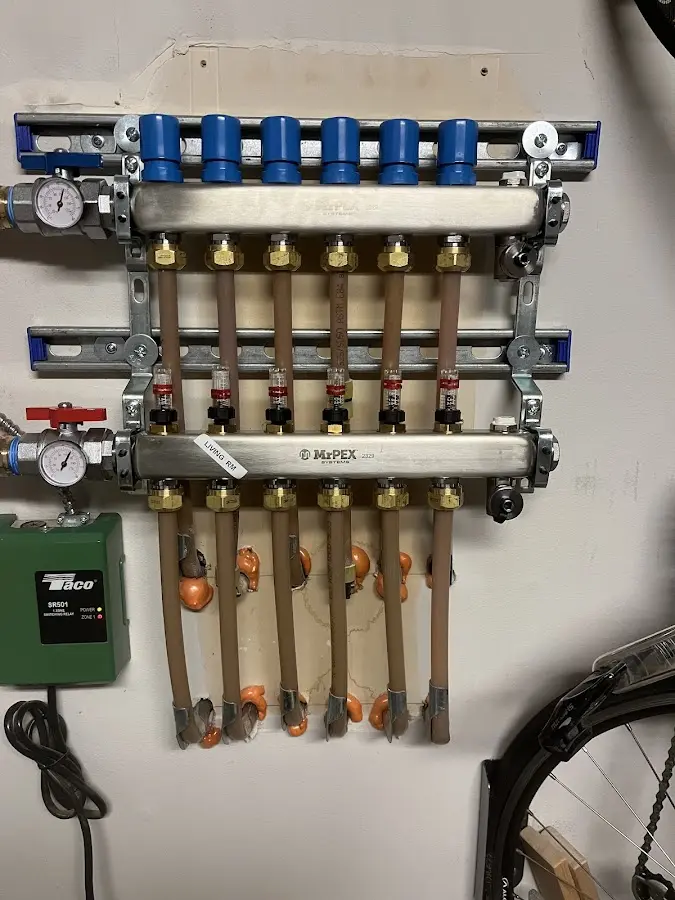 Plumber performing Leak Detection at a residential property in Agawam Town